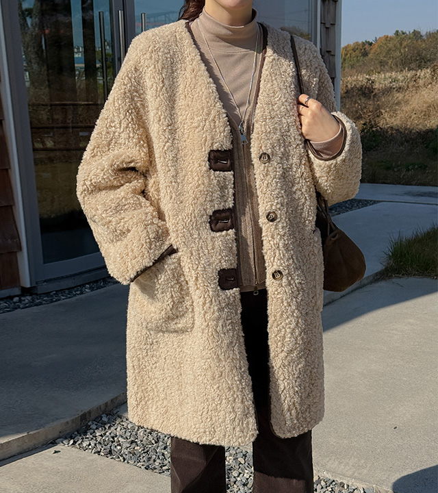 Fuzzy shearling mid-length coat