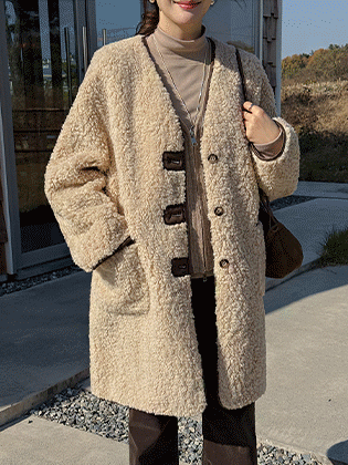 Fuzzy shearling mid-length coat
